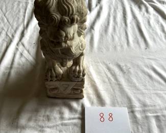 $350 - $500.	Chinese carved Foo dog, marble.  Measures about 12" tall.