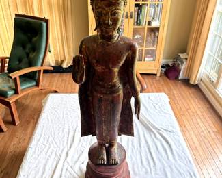 $1,500 - $2,000.	Standing Thai Buddha, Ayutthaya style, 17th century.  Measures approximately 41" tall.
