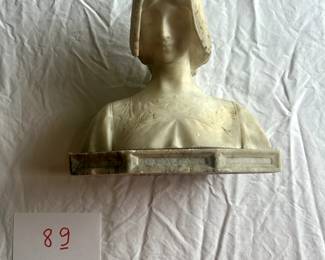 $1,500 - $2,000.	Alabaster bust, signed on base, attributed to Angiolo Malavolti.  Measures approximately 10" by 10.5".