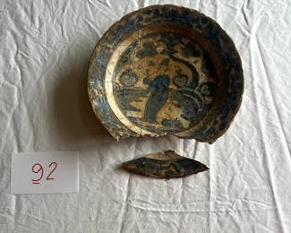 $350 - $500.	Ancient blue and white pottery, repieced with one part needing reglued.  Measures approximately 11" in diameter.