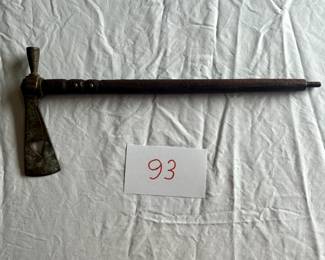 $500 - $750.	Native American studded tomahawk pipe, incised blade.  Measures 18" long.