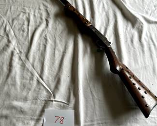 $750 - $1,000.	Studded Native American rifle 2 (nonoperational).