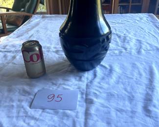 $3,000 - $5,000.	Lee Tafoya incised blackware pot, Avanyu figure, signed on bottom.  Measures approximately 8" by 12".