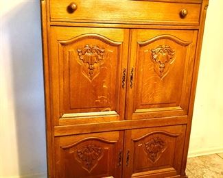 Rare vintage carved bar cabinet