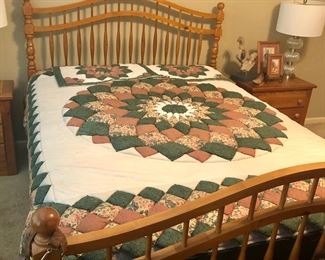 Queen oak bed and quilt