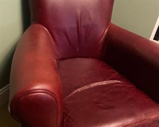 The color this chair is much more brown then depicted in photos. It does have a hint of red undertones. I will try to get more accurate photos. 