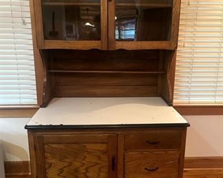 Hoosier cabinet with enamel counter $600.00