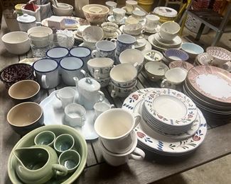 More cups, saucers, tea sets, plates.