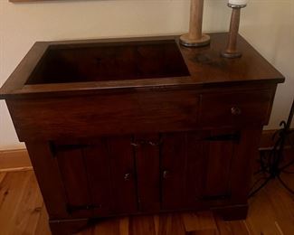 Custom carved wash basin cabinet by "Jerry" of New York. $175.00