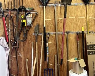various tools, rakes, gas cans etc.