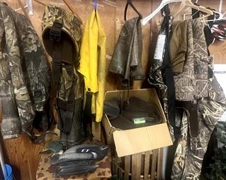 Hunting and fly fishing gear: boots, wet suits camouflage overalls, duck decoys, waders, fishing poles, fishing bait, hooks, tackle boxes