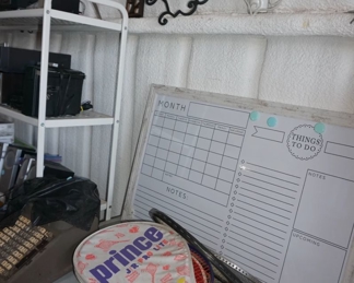 white board, crosses, rackets