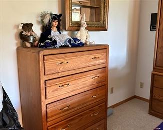 Dresser matched mirrored cabinet in back of bed and the two chests on each side of the King bed $75.00