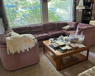 Beautiful sectional on main floor $375.00. Oak coffee table 