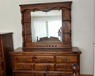 Dresser with mirrored back, matched bed and other dresser. Sold separately