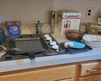 Over View of Kitchen Items, Griddle, Corning-ware, Plates, Serving Dish