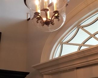 Pretty foyer light fixture - illuminated