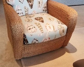 Stylish side chair with seashell print cushions