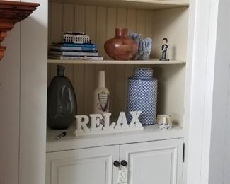 Built-in cabinetry and set of two accents stools