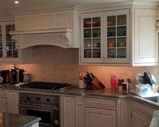 Quality Custom Cabinetry - upper cabinets with glass fronts