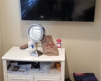 Flat screen TV; entertainment cabinet