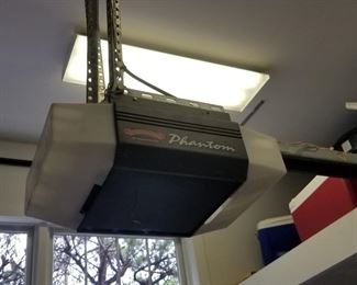 Garage door opener and insulated 7 ft. tall x 10 ft. wide garage door 