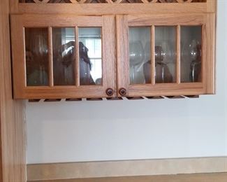 Kitchen cabinetry detail - wine storage and stemware system