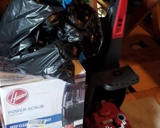 Lots of goodies in the attic, which will be put on tables for the sale - vacuum cleaners and household items