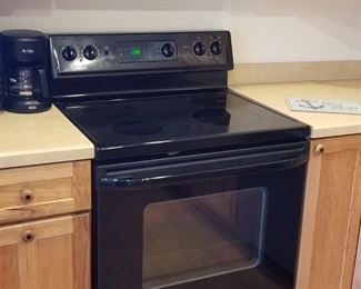 Kenmore electric range; Kenmore microwave oven  mfg. July 2018