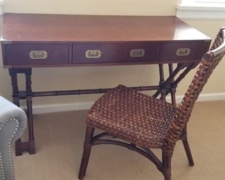 Campaign desk; rattan chair