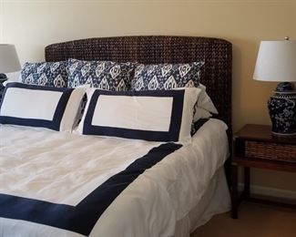 Lovely Lane queen bedroom set. Rattan headboard. Beautiful bedding. 