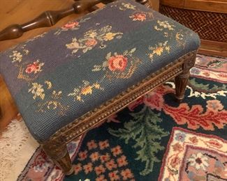 Antique French footstool with needlepoint and nailheads, $200