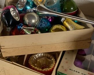 Boxes and loose vintage Shiny Brite Christmas ornaments 