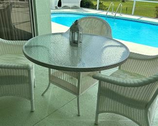 Outdoor vinyl wicker - glass topped table and 4 chairs