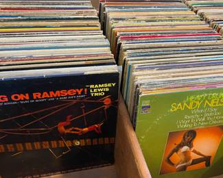 Over one thousand $2 LP’s • day one price 