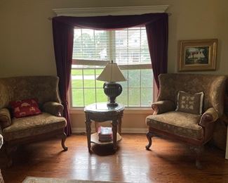 Great overstuffed side chairs, side table and curtains