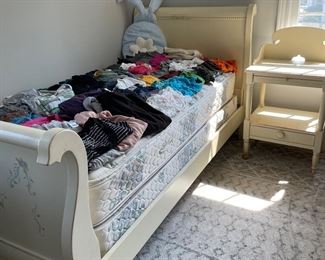 Twin bed with Sealy mattress and nightstand. Also, lots of junior name brand clothes 