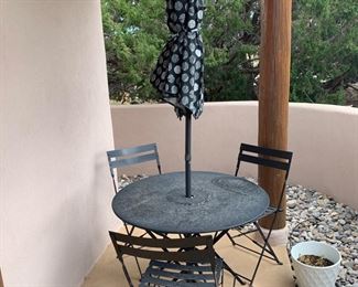 Metal bistro set with umbrella