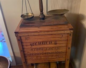 Antique store display cabinet, scales and butter churn