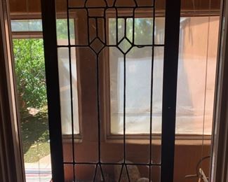 One of a pair of leaded glass pieces