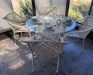 Another patio set with 4 chairs and umbrella (not shown)