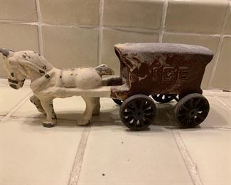 Antique cast iron horse drawn ice wagon
