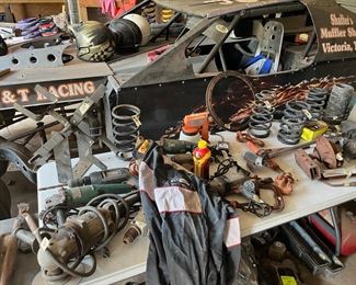 Shaffer's Muffler T & T Racing Car hiding behind this table full of parts!