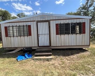 Large portable building to be moved.  