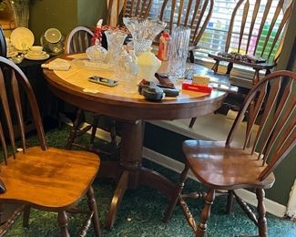 Counter-height tile inlaid table and tall chairs