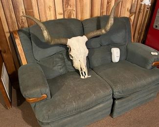 Double recliner love seat - but you will have to coax this guy away from it!