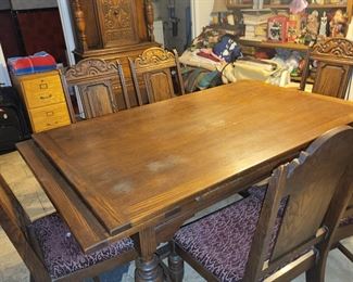 Matching dining table with 1 captain's chair & 5 regular chairs. 2 pull out extensions. 60"l, 37 3/4 w, ( 86" with extensions pulled out)  $350.00