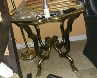 Brass & glass side table. $150.00