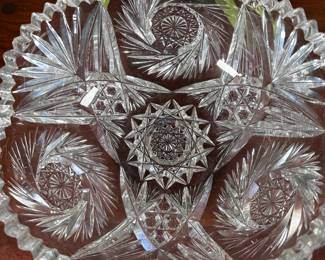 Cut crystal saw tooth edge bowl with fans and hobswirls, a few chips to the edges, 4"H x 10"W