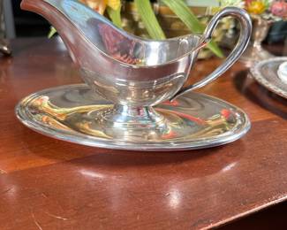 Silver-plated gravy server with attached spill dish